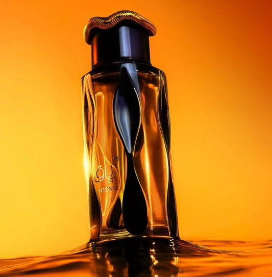 Teriaq Intense eau de parfum bottle with dark glass and amber-tinted highlights