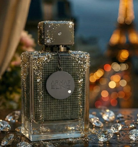 Eau de parfum bottle with sparkly silver cap and textured silver glass
