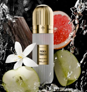 French Tobacco extrait de parfum bottle with gold cap, white flower and green fruit