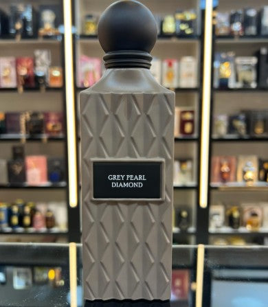 Grey pearl diamond eau de parfum bottle with faceted glass and front label