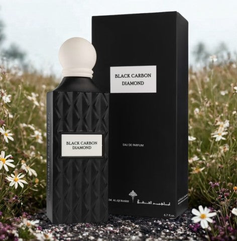Black carbon diamond eau de parfum bottle with white cap and label, paired with box