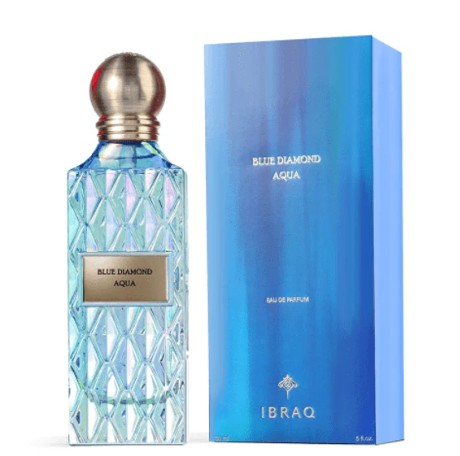 Blue glass eau de parfum bottle with faceted pattern and gold-tone cap