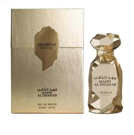 Arabiyat Prestige perfume gift set: gold faceted bottle and beige presentation box