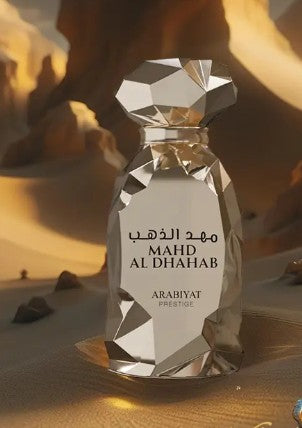 Faceted gold perfume bottle with cap and label reading MAHD AL DHAHAB