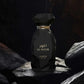Arabiyat Prestige Al Noor eau de parfum bottle, black faceted glass with gold cap