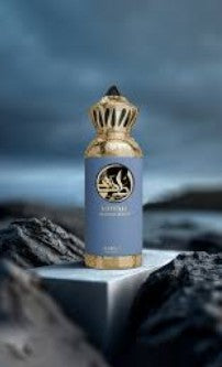 Blue eau de parfum bottle with gold ornate cap, standing on dark surface