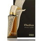 Perfume bottle in angled view with metallic cap, silver patterned label, and amber liquid.