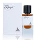 Eau de parfum bottle with black cap beside white box, amber liquid in view.
