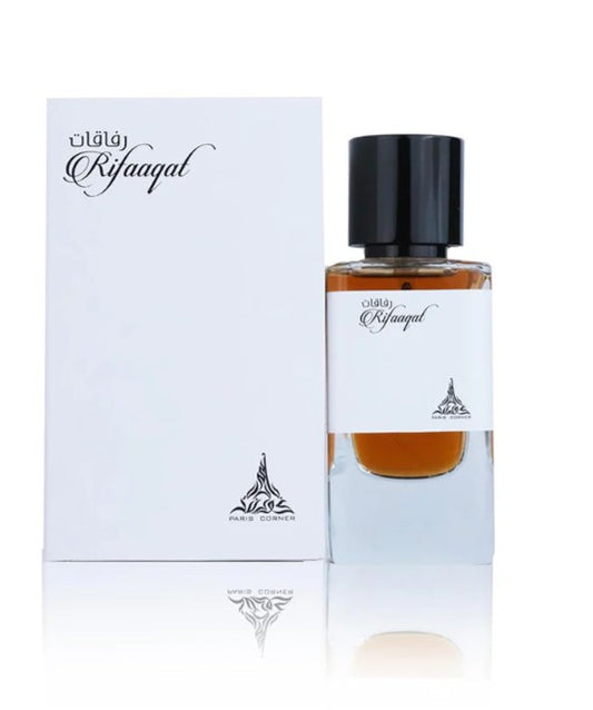 Eau de parfum bottle with black cap beside white box, amber liquid in view.
