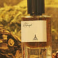 Eau de parfum bottle with black cap and amber liquid, front label visible.