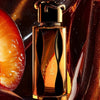 Lattafa Teriaq Intense eau de parfum bottle, gold cap, dark glass