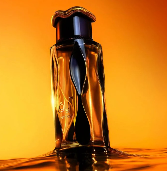 Teriaq Intense eau de parfum bottle with dark glass and amber-tinted highlights