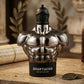 Armaf eau de parfum bottle with chrome torso design and black Spartan-style cap