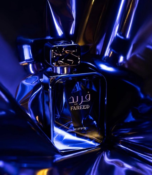 Riiffs Fareed Eau de Parfum bottle close-up, metallic cap, deep blue glass