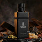 Perfume bottle with black and gold cap, 'III THRILLER' label, Maison Asrar