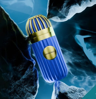 Blue ribbed fragrance bottle with gold cap and circular logo label