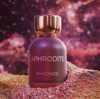 Maroon perfume bottle with gold cap, APHRODITE MYKONOS on textured base