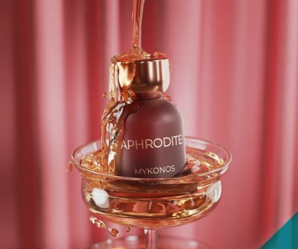Maroon fragrance bottle with gold cap, APHRODITE MYKONOS text and gold ring