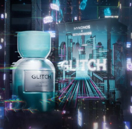 Teal glass perfume bottle with GLITCH label and glossy rounded cap