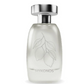 Mykonos extrait de parfum bottle close-up in pale cream with leaf print and silver cap