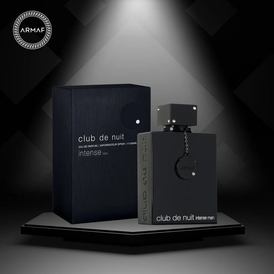 Men's fragrance bottle and box, dark navy, 'club de nuit intense man'.